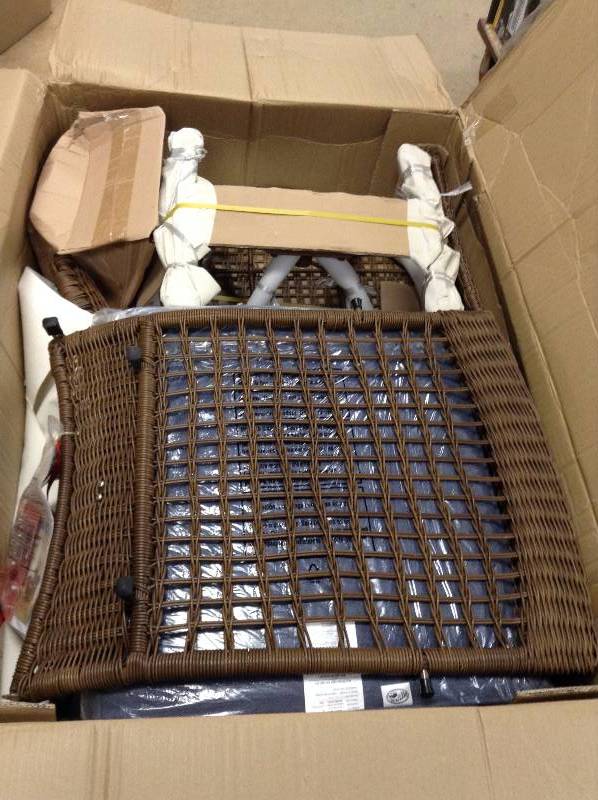 lot 49 image: Hampton Bay Spring Haven Brown All-Weather Wicker Patio Swivel Rocking Chair with Sky Blue Cushions Model#  66-20344 open box never used