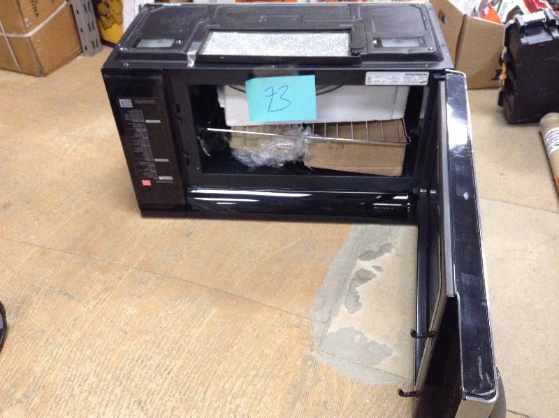 lot 73 image: Samsung  Over-the-Range Microwave Stainless Steel in like New working conditions