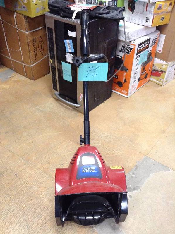 lot 76 image: Toro 12 in. Power Shovel Electric Snow Blower in working conditions
