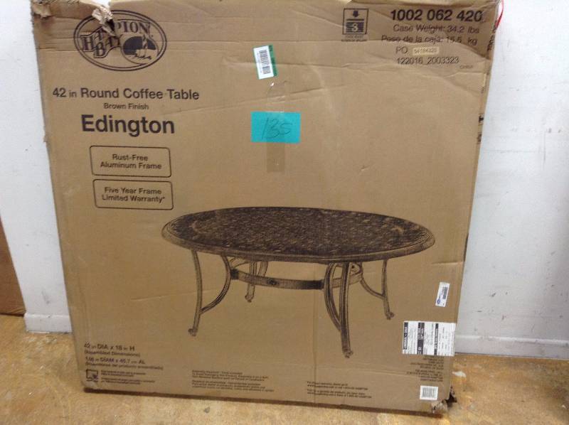 lot 135 image: Hampton Bay Edington Round 42 in Coffee Table