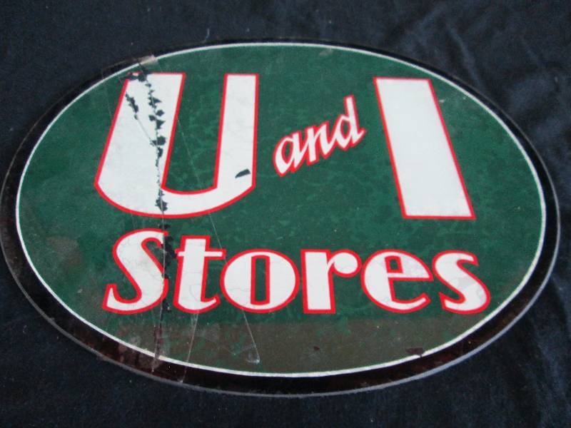 lot 66 image: U And I Stores Glass Sign