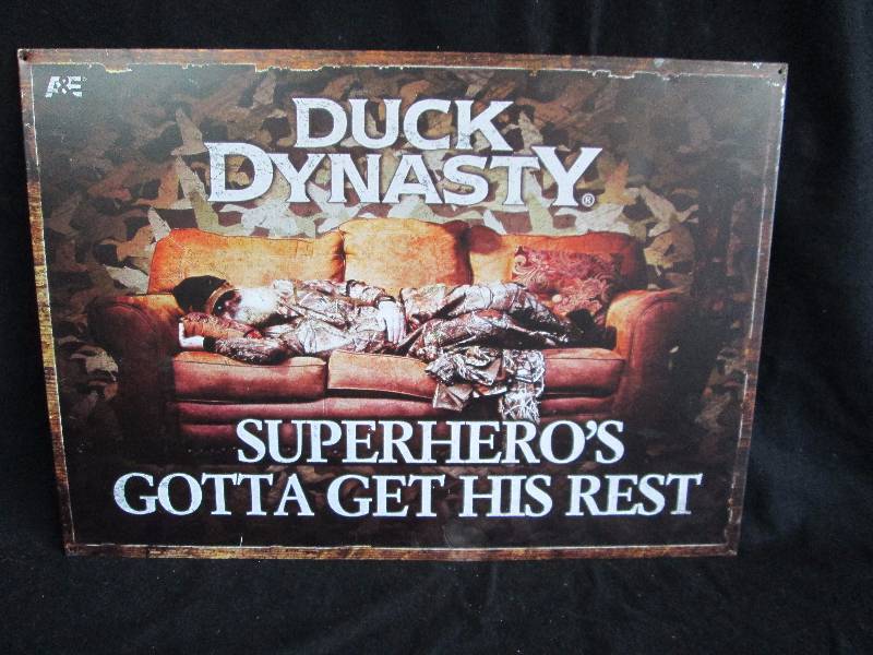 lot 72 image: Duck Dynasty Collectable Sign