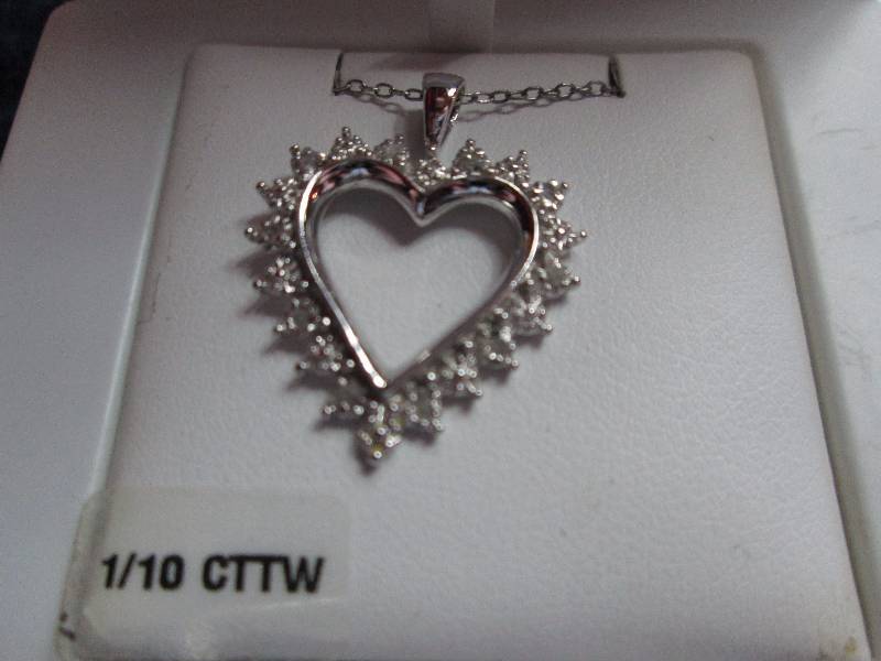 lot 216 image: Sterling Sliver necklace with Diamonds.