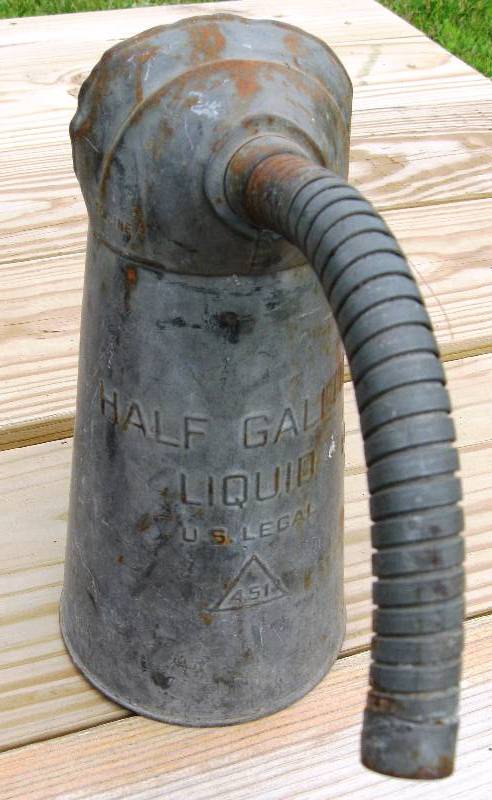 lot 109 image: Vintage 1 and 12 gallon oil cans