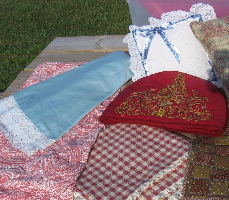 lot 134 image: Vintage Tablecloths, Pillows, Doilies, Hankies, & more