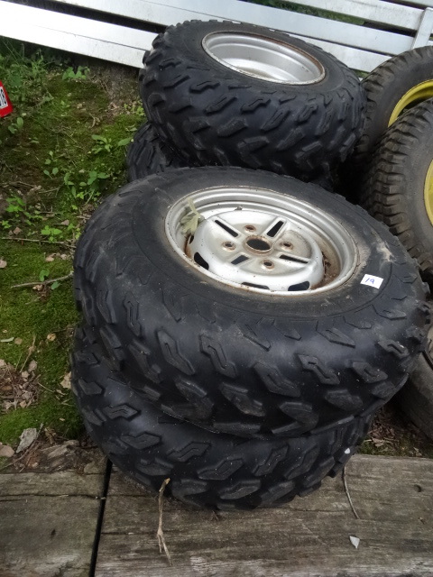 lot 19 image: 4 Tires Off of a 4 Wheeler.