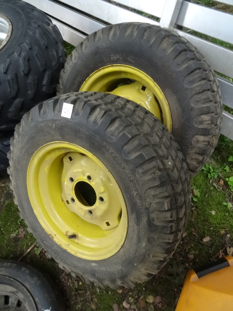 lot 21 image: 2 Lawn Tractor Tires with Rims.