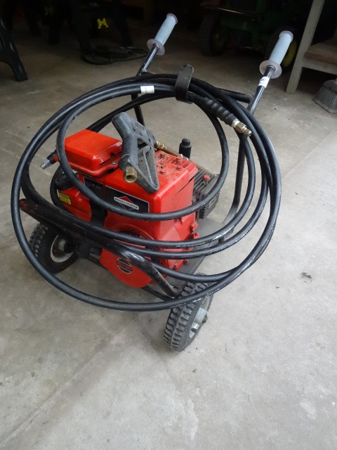 lot 28 image: Pressure Washer. 5 HP Briggs Motor.