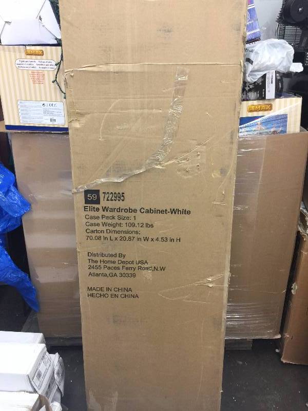 lot 19 image: Hampton Bay Select 65 in. H MDF Wardrobe Cabinet in White Model#  THD90069.6a.Stopen box never used