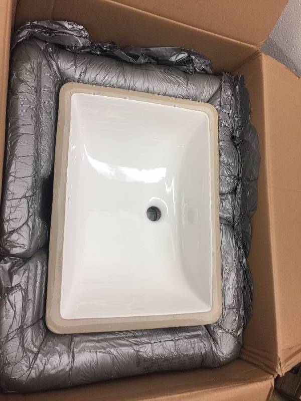 lot 24 image: American Standard Studio Rectangular Undermount Bathroom Sink in Linen Model # 0618.000.222 open box never used
