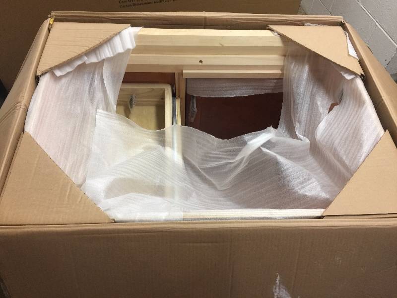 lot 32 image: Foremost Naples 30 in. Vanity Cabinet Only in Warm Cinnamon Model#  NACA3021D open box never used