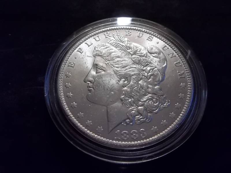 1883 O Morgan Silver Dollar High Grade MS (In MS60 $70.00)