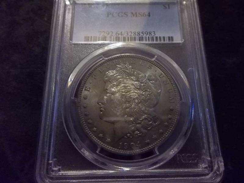 1904 O Morgan Silver Dollar Very High Grade MS64 PCGS Certified Nicely Toned (Valued  $100.00)