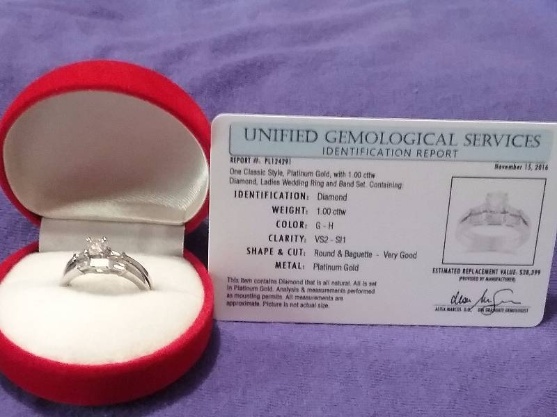 lot 77 image: Platinum Diamond Baguette Engagement Ring, 1.00 ctw, Clarity VS2-SI1, Color G-H.
