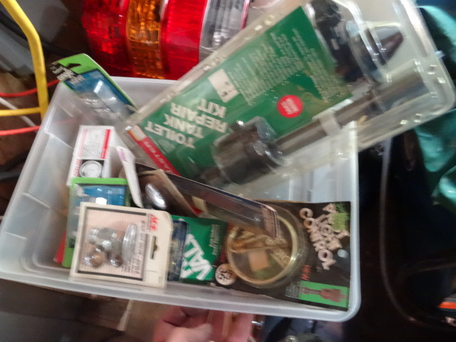 Bin Full of Plumbing Parts
