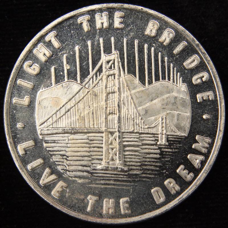 lot 15 image: 1 TROY OZ. .999 FINE SILVER 50 YEAR ANNIVERSARY GOLDEN GATE BRIDGE