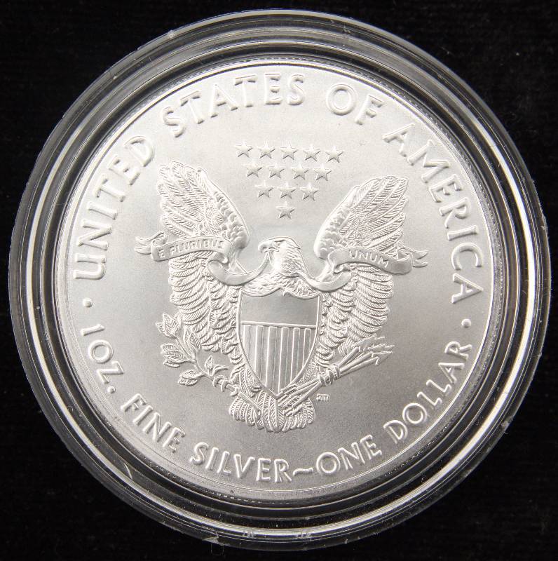 lot 26 image: 2016 AMERICAN SILVER EAGLE 1 TROY OZ. .999 FINE SILVER DOLLAR IN AIRTITE HOLDER