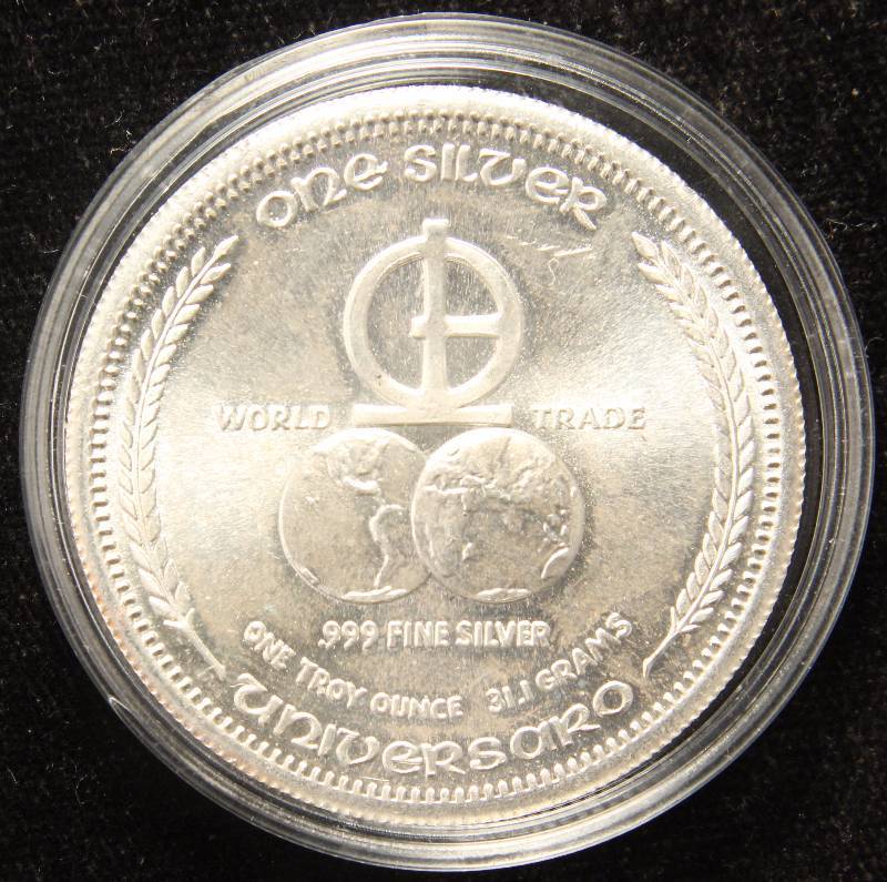 lot 42 image: 1 TROY OZ. .999 FINE SILVER VINTAGE 1972 WORLD TRADE UNIT IN AIRTITE