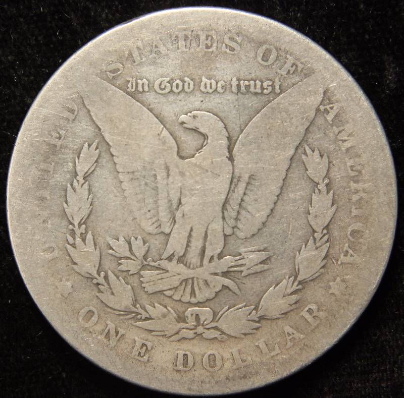 lot 54 image: 1885 MORGAN SILVER DOLLAR IN LOW GRADE