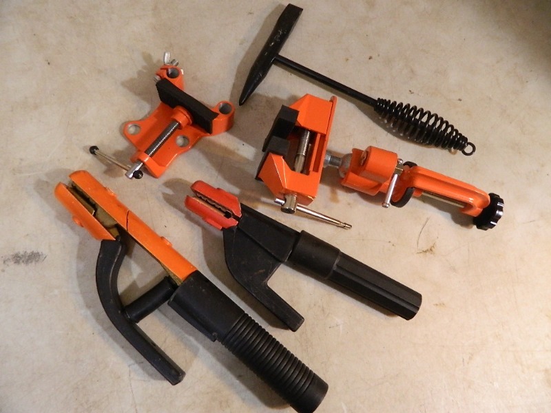 lot 55 image: New Stick Welder Handles, Vise, and More