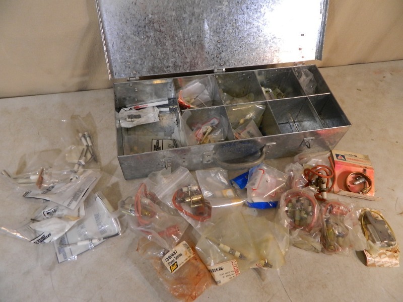 lot 70 image: Case With New Furnace Parts