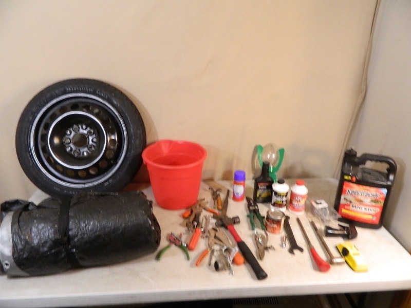 lot 79 image: Tools, Tarp, New Tire, Etc