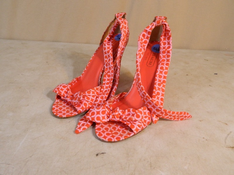 lot 141 image: Coach Heels