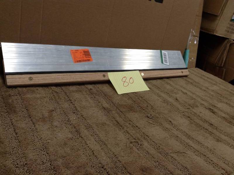 lot 80 image: Frost King EO 5-58 in. x 36 in. Adjustable Threshold Model#  TAOC36A