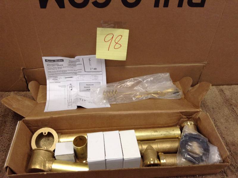 lot 98 image: American Standard Tub and Shower Drain 1583.470.020 White open box never used