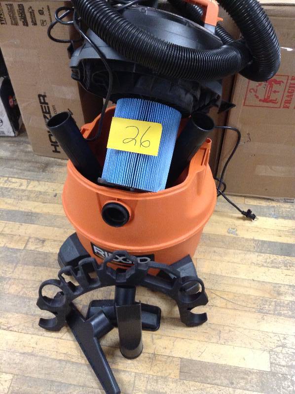 lot 26 image: RIDGID 14 gal. 6.0-Peak HP Wet Dry Vac in like New working conditions