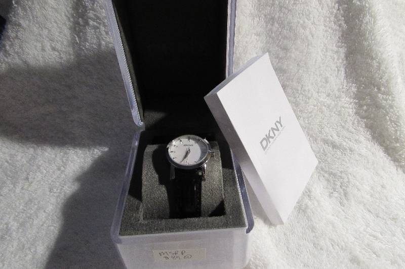 BLACK STRAP DKNY WATCH, MSRP $85.00