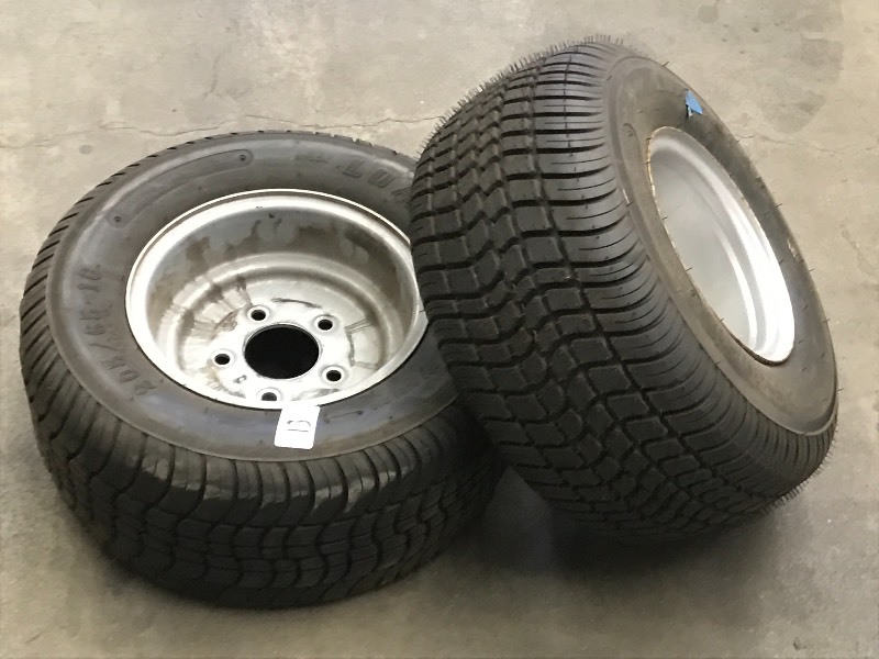 lot 13 image: (2) 20.5810 Trailer Tires On 5-Lu...