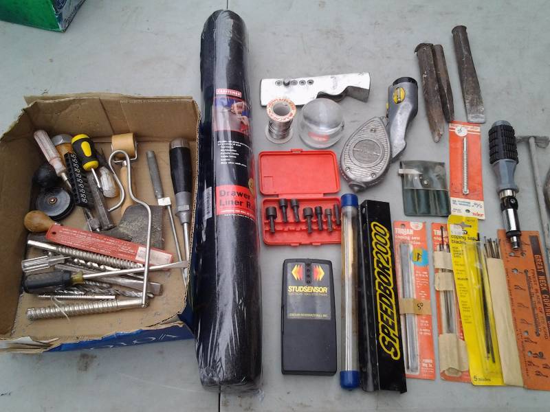 lot 69 image: Chisels, Pry Bars, Chalk Line, Tool Box Liner (Roll), Coping Saw Blades.