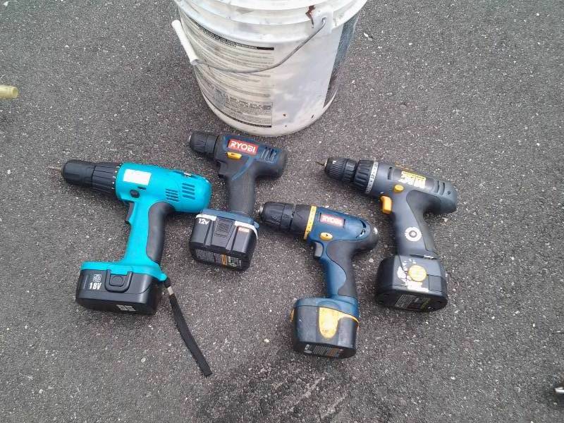 lot 106 image: 12 Volt Ryobi, 9.6 Volt Ryobi, 12 Volt McCullough & Other 18 Volt All Cordless Drills-No Charger With Batteries