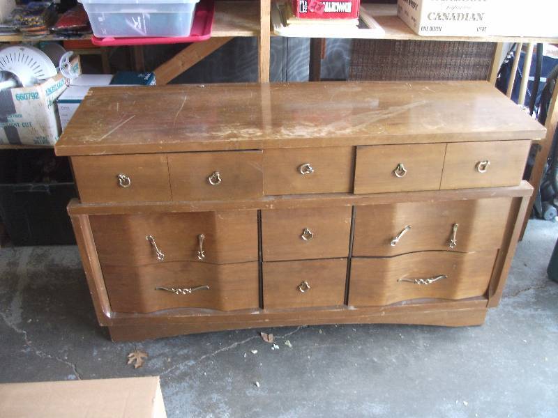 lot 28 image: 9-Drawer Dresser By The Real McCoy Furniture Co., 56x18x32