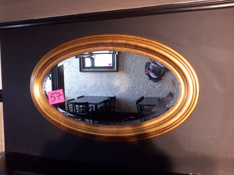 lot 57 image: Beveled edge oval mirror