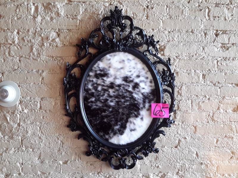 lot 65 image: 2 Simulated cow hide dcor with plastic frames