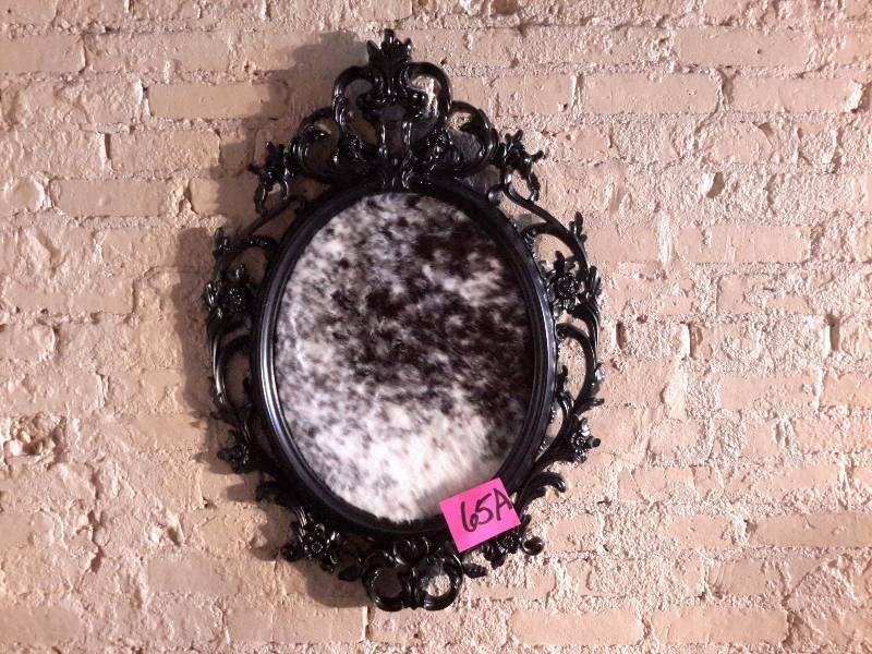 lot 65A image: 2 Simulated cow hide dcor with plastic frames