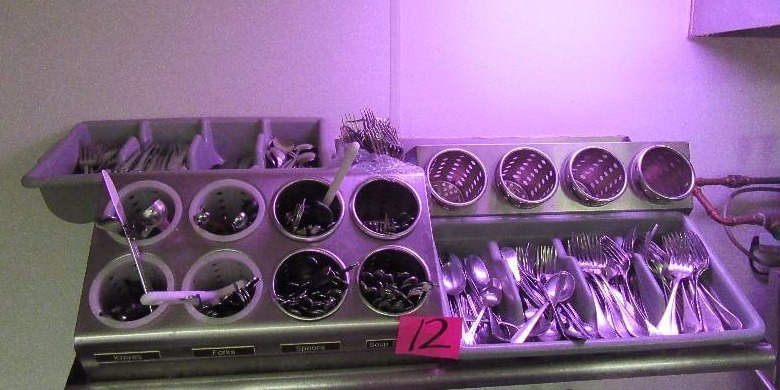 lot 12 image: Misc. Silverware.. Knives, spoons, forks.. Holders included as shown