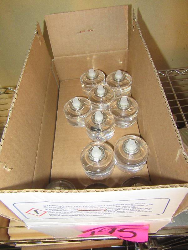 lot 195 image: 23 box of pure lite candle fuel  2 packages of tea light candles