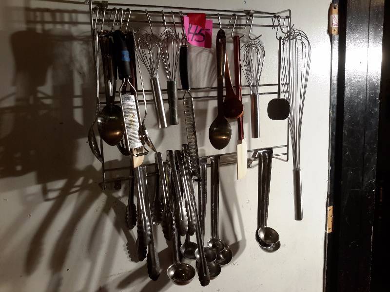 lot 145 image: Large lot of kitchen utensils and rack as pictured. You must remove the rack