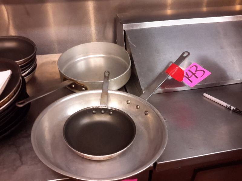 lot 143 image: 3 Steel frying pans.. 15in, 12in x 8 12 in