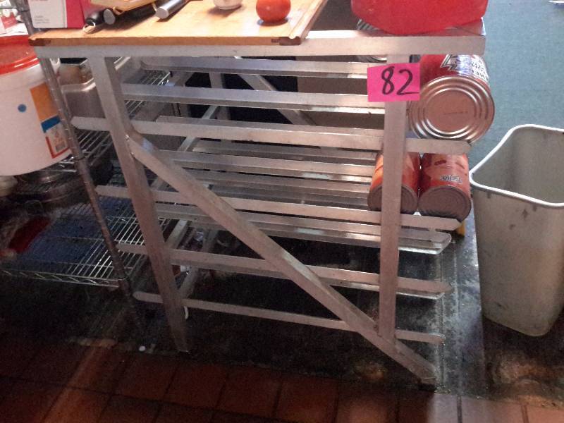 lot 82 image: Stainless steel No 10 can rack.