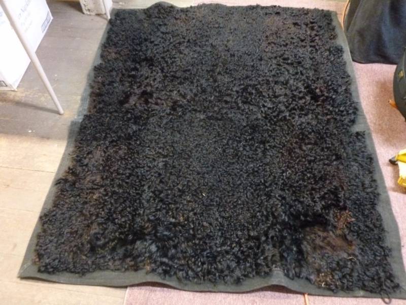 lot 3 image: Vintage Bison Rug