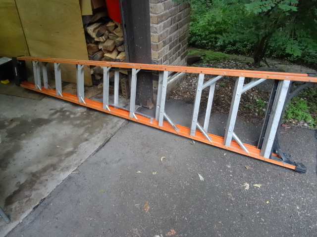 lot 32 image: 10 ft Husky fiberglass ladder. Good...