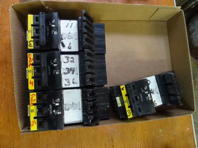 lot 38 image: Qty 4 Square D 3 pole 20 amp Breake...