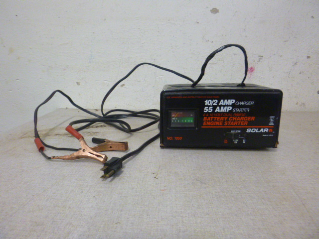 lot 142 image: Solar Dual Range Battery Charger