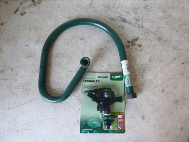 lot 97 image: Orbit Sprinkler Head and Base