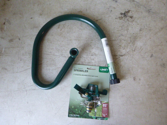 lot 98 image: Orbit Sprinkler Head and Base