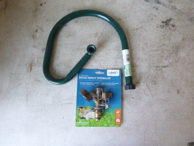 lot 99 image: Orbit Sprinkler Head and Base